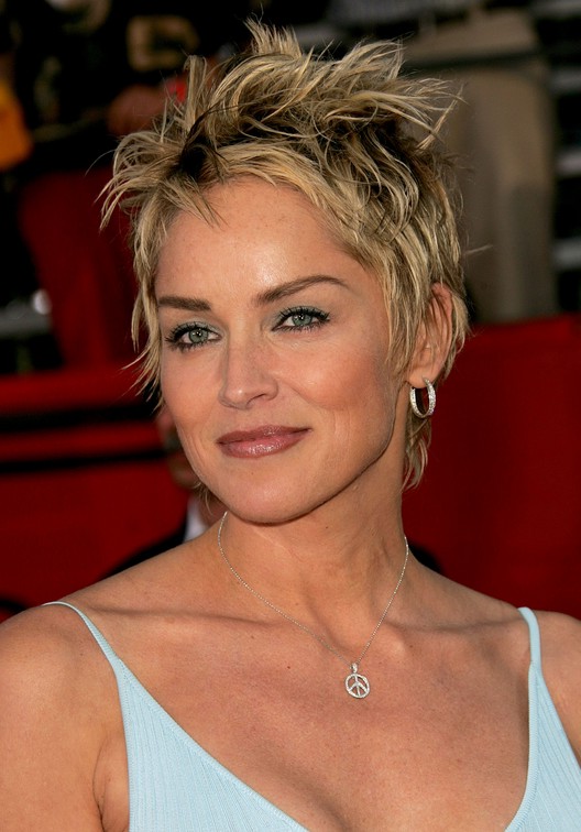 Layered tousled short pixie haircut for women over 50: Sharon Stone Hairstyles